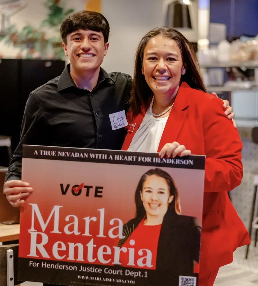 Margie with a candidate and her sign