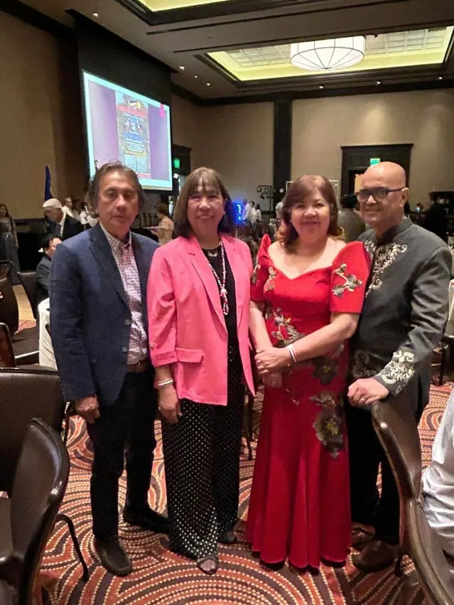 Guests in formal attire at a gala