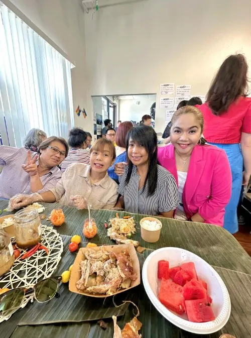 Guests sharing a Kamayan lunch