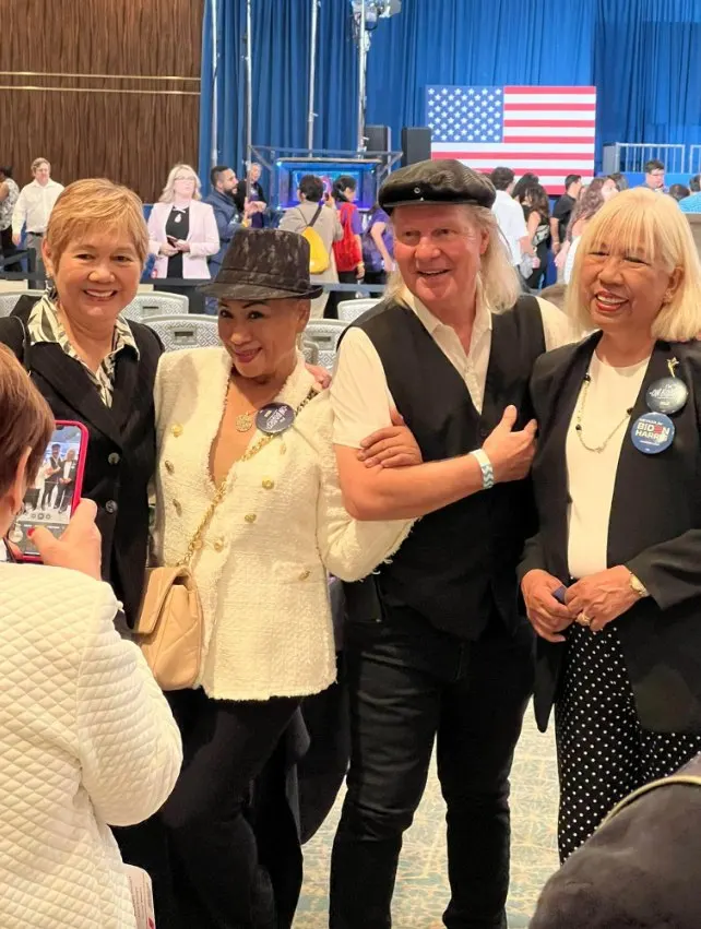 Friends posing at a rally