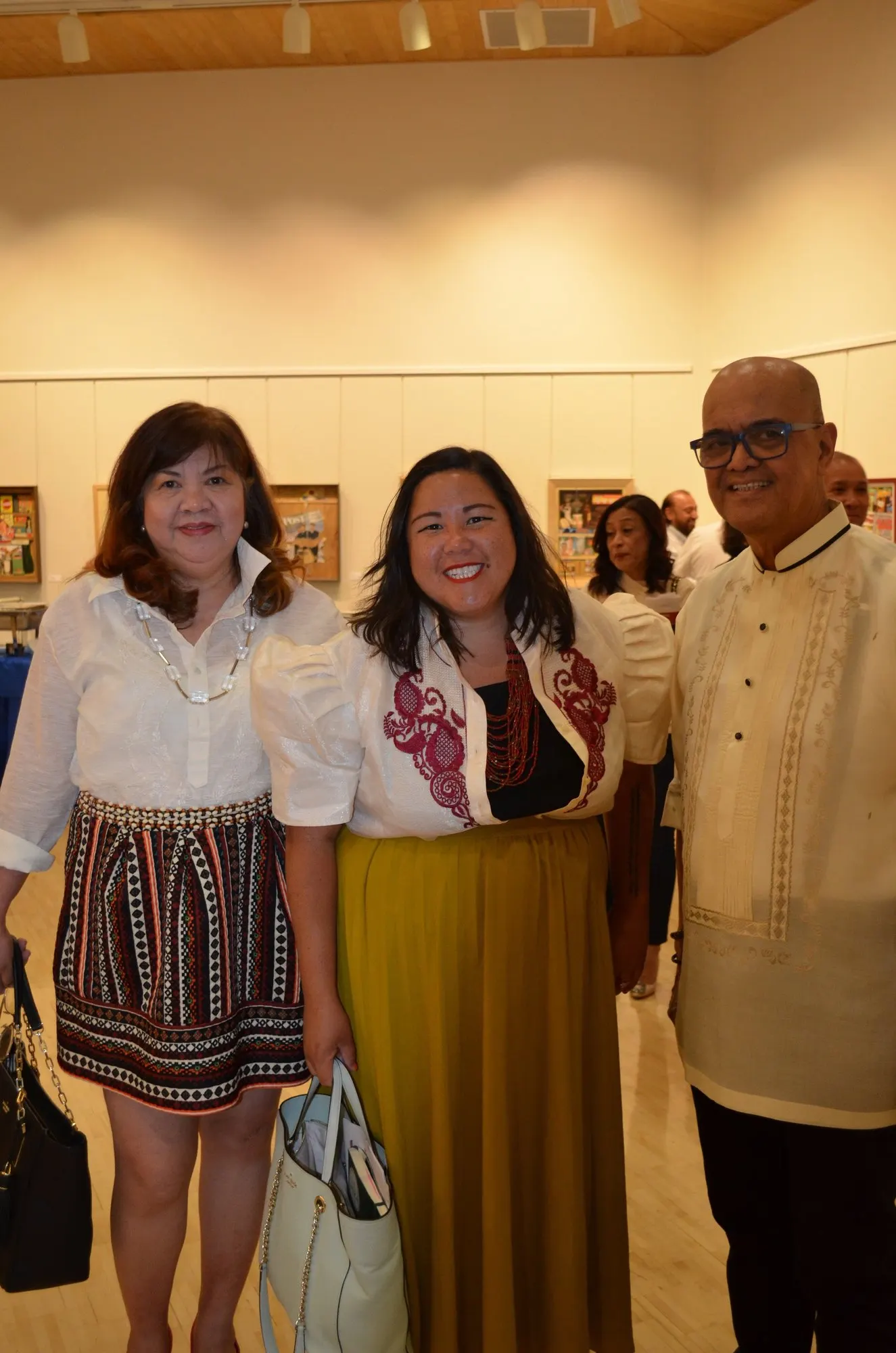 Women in Filipiniana dresses at a cultural event